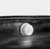Close-up of a white vent on a black flexible material, likely part of a collapsible water barrel. Náhled obrázku produktu