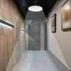 A modern hallway with a ceiling light illuminating the space. Náhled obrázku produktu