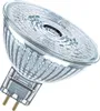 A close-up studio shot of a clear glass light bulb with silver metal pins. Produktbild-Vorschau