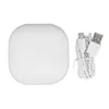 A white charging case and a white USB-C charging cable are displayed on a white background. Produktbild-Vorschau