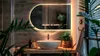 A modern bathroom with a sink, mirror, and plants. Produktbild-Vorschau