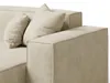 A close-up view of a beige sectional sofa with two pillows. Produktbild-Vorschau