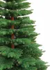 A close-up view of the branches and trunk of an artificial Christmas tree. Produktbild-Vorschau
