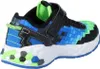 A side view of a child's sneaker with a pixelated design. Náhled obrázku produktu