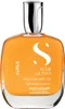 A bottle of hair oil on a white background. Produktbild-Vorschau