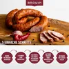 Sausages on a wooden board with ingredients and instructional steps. Produktbild-Vorschau