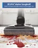 A vacuum cleaner head is cleaning up a spill of spaghetti and sauce on a kitchen floor. Produktbild-Vorschau
