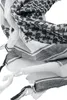 A close-up, studio shot of a folded scarf. Produktbild-Vorschau