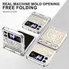 Three phone cases for a Samsung Galaxy Z Flip 4 are displayed on a white and light gray background. The cases have a metallic, intricate design. Produktbild-Vorschau