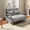 A gray sofa bed with two pillows in a living room setting. Anteprima dell’immagine prodotto