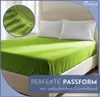 A fitted sheet on a bed with pillows. Produktbild-Vorschau