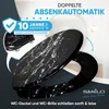 A black and white marble-patterned toilet seat and lid are displayed against a white and gray background, with promotional text and a warranty badge. Náhľad obrázku produktu