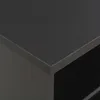 A close-up view of the corner of a black bar table. Voir les images du produit