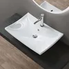 A white ceramic sink with a chrome faucet is shown on a dark countertop, with wooden flooring visible below. Produktbild-Vorschau