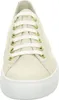 A close-up, front-facing view of a cream-colored sneaker with white laces and gold eyelets, set against a white background. Produktbild-Vorschau