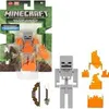 A Minecraft Skeleton toy figure in its packaging, with additional accessories and a separate figure shown. Náhled obrázku produktu