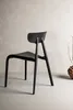A black chair is shown against a textured light gray and white background. Podgląd zdjęcia produktu