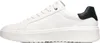 A side view of a white sneaker with a black heel accent. Anteprima dell’immagine prodotto