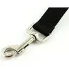 A close-up shot of a metal clasp and black strap, likely part of a dog leash or harness. Náhľad obrázku produktu