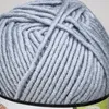 A close-up view of a ball of gray yarn. Produktbild-Vorschau