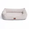 A beige corduroy dog bed is shown against a white background. Anteprima dell’immagine prodotto