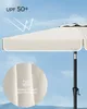 A close-up view of a beige umbrella canopy with a black pole, set against a bright sky. A circular inset shows a magnified view of the fabric with water droplets, indicating water resistance. Text overlays highlight UPF 50+ protection and material properti Produktbild-Vorschau