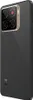 A close-up, angled view of the back of a black smartphone. Produktbild-Vorschau