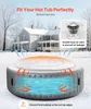 An inflatable hot tub cover in a snowy environment with a house in the background. Produktbild-Vorschau