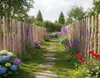 A garden path lined with wooden fences and blooming flowers. Produktbild-Vorschau