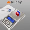 A digital scale with gemstones on it and a logo in the background. Náhľad obrázku produktu