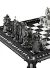 A close-up, angled view of a Harry Potter themed chess set. Podgląd zdjęcia produktu