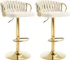 Two cream-colored bar stools with gold legs and accents, shown against a white background. Produktbild-Vorschau