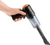A hand holding a black and orange handheld vacuum cleaner. Produktbild-Vorschau