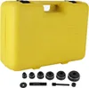 A yellow carrying case for a hydraulic knockout punch set is shown with the tools laid out in front of it. Náhľad obrázku produktu