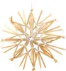 A straw star ornament is shown against a white background. Produktbild-Vorschau