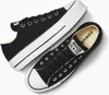 A pair of black Converse Chuck Taylor All Star Lift Ox sneakers are shown from a top-down perspective against a white background. Voir les images du produit