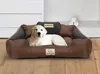 A golden retriever puppy lies comfortably in a brown and gray dog bed with pillows. Voir les images du produit