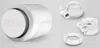 A white smart thermostat and its accessories are displayed against a light gray background. Produktbild-Vorschau