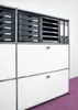 A modular storage unit with drawers and file holders. Voir les images du produit