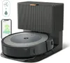 A robot vacuum cleaner with its charging and cleaning station, next to a smartphone displaying a cleaning map. Voir les images du produit
