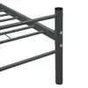 A close-up view of a gray metal bed frame, showing the leg and support slats. Produktbild-Vorschau
