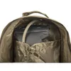 Close-up view of the inside of a backpack, showing a hydration bladder and a drawstring pocket. Náhľad obrázku produktu