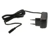 A black power adapter with a coiled cable and a European plug. Produktbild-Vorschau