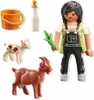 A collection of Playmobil figures and accessories, including a girl, two goats, a milk bottle, and a bucket. Produktbild-Vorschau
