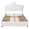 A white bed frame with a slatted base, shown from the front. Náhľad obrázku produktu