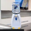 A penguin-shaped water dispenser with a water bottle on top, placed on a counter. Produktbild-Vorschau