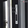 A close-up view of a door lock mechanism and handle. Podgląd zdjęcia produktu