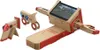 A set of Nintendo Labo cardboard creations, including a robot-like controller, a motorcycle, and a stand for a screen. Produktbild-Vorschau