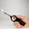 A hand holding a black lighter with a flame. Produktbild-Vorschau