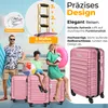 A family at an airport with pink luggage. Produktbild-Vorschau